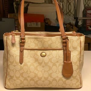 Coach multicompartment satchel.
